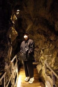 Man in cave or underground space