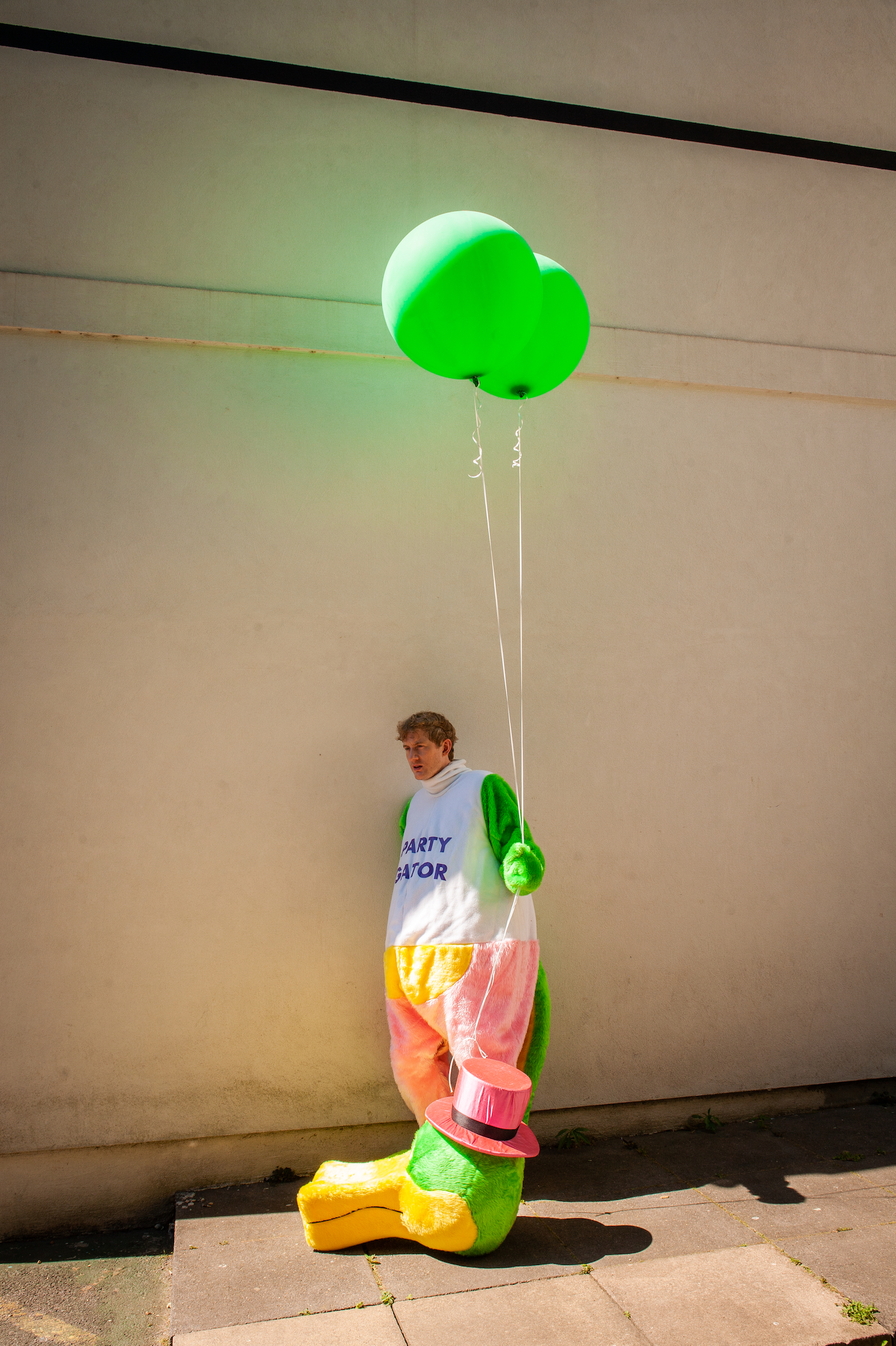 James Acaster as the Party Gator from Temps